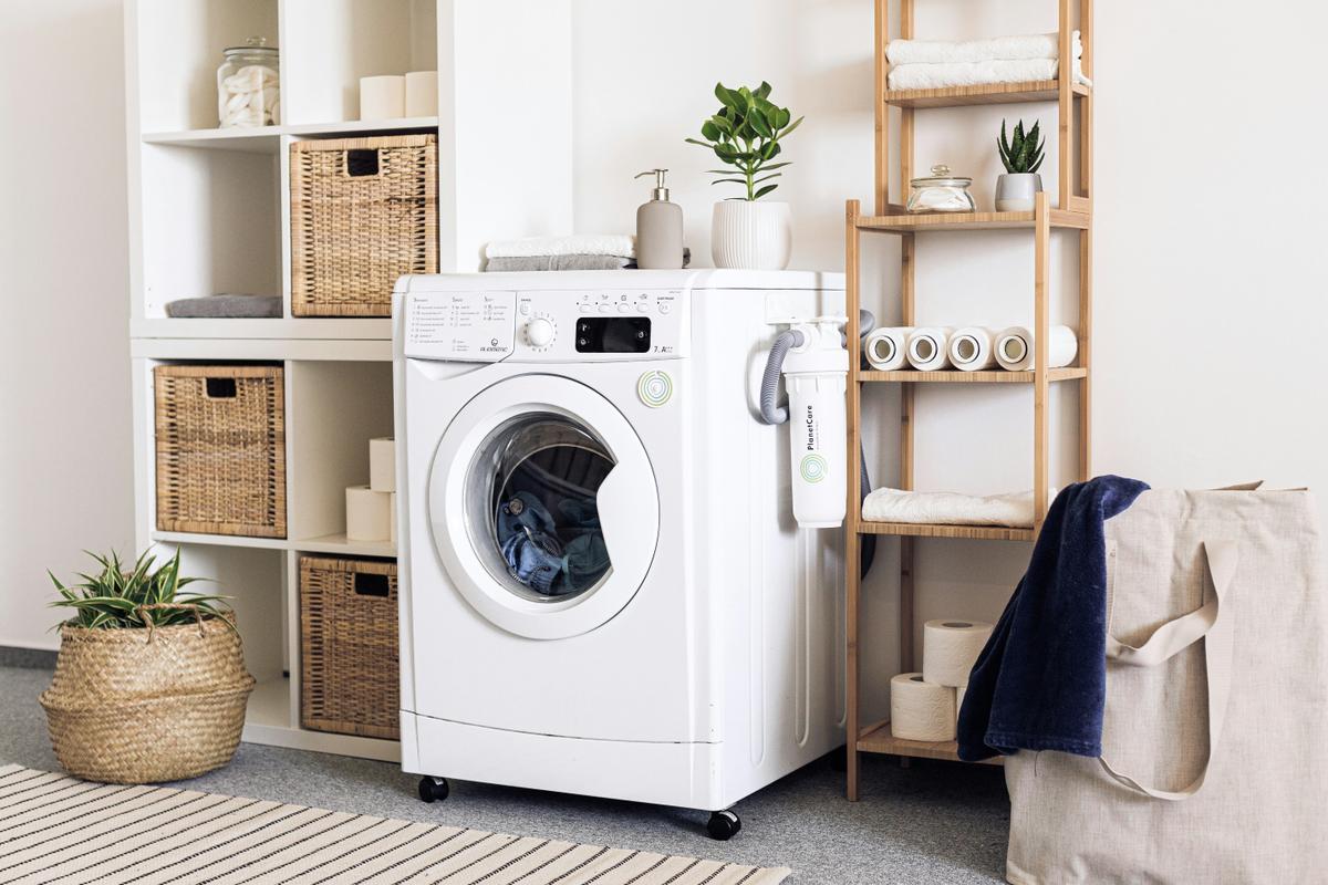 Professional white front-load washing machine - modern laundry equipment